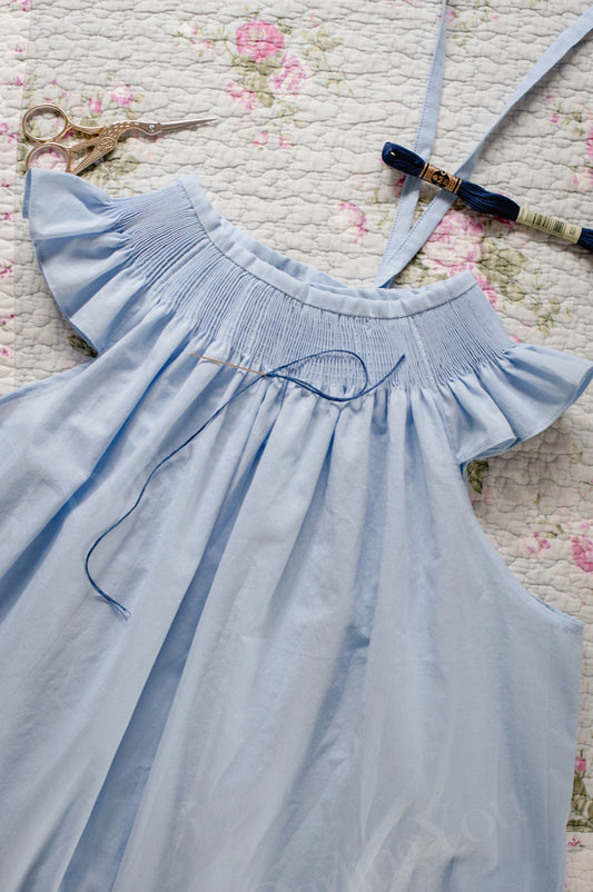 Angel sleeves ready to smocked kids dress finished in Sky Blue. Heirloom Summer and Spring dress.